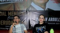 Rusdin Abdullah bersama istrinya Andi Debbi Purnama. (Ist)
