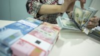 Dolar AS kian tertekan akibat kerusuhan di berbaga kota d negara Paman Syam itu. (Int)